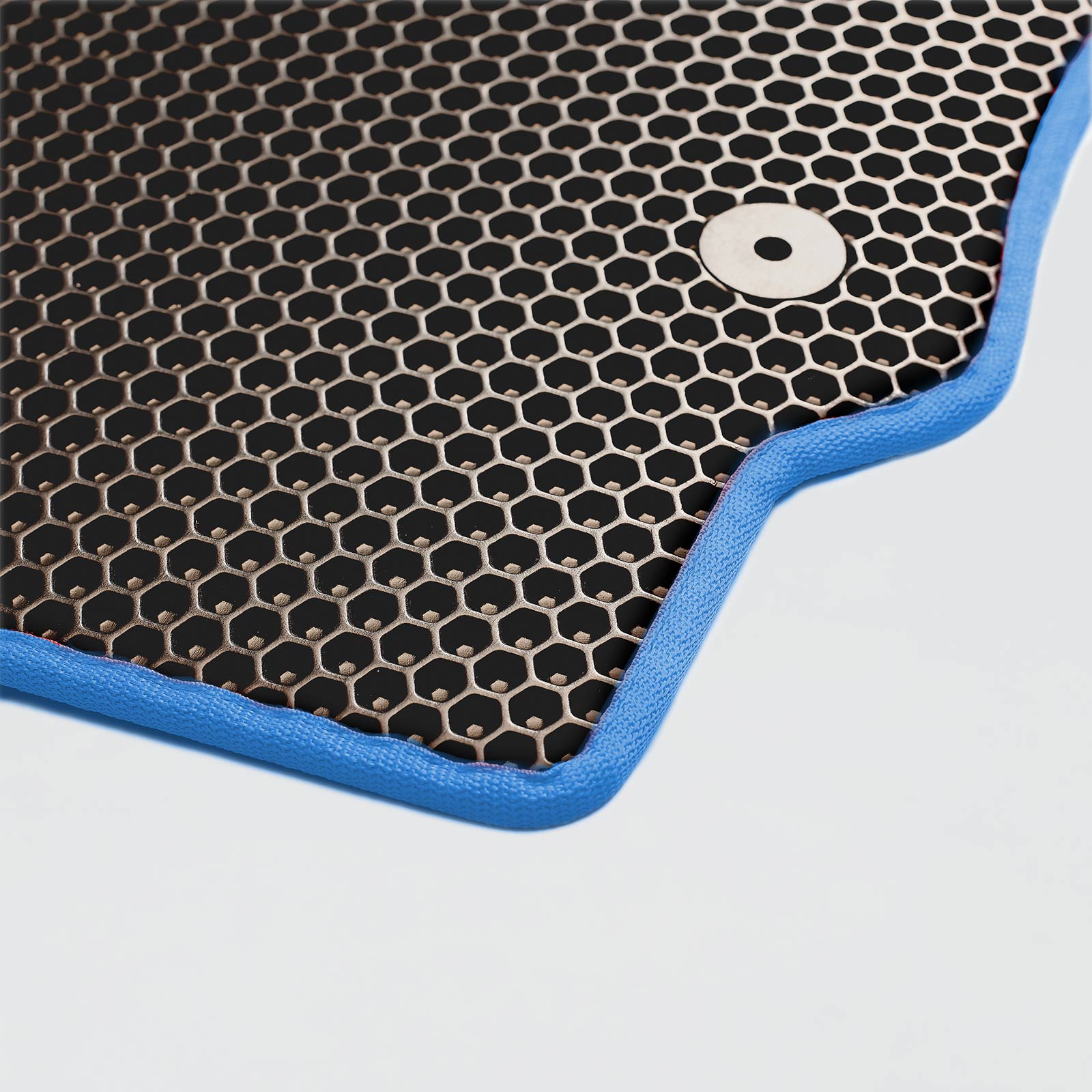 A black honeycomb mat with a blue edge, suitable for various surfaces.