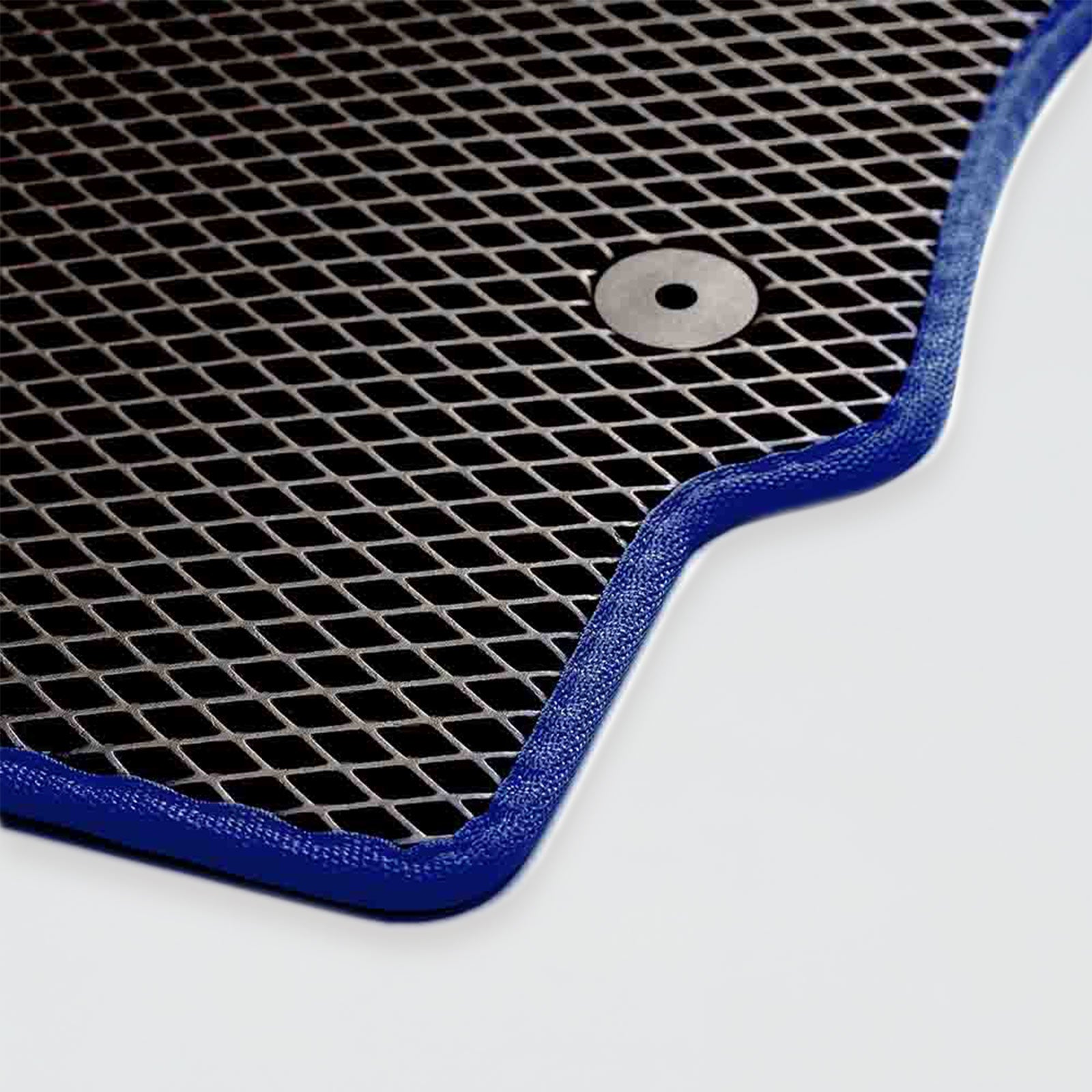 A blue-edged car mat with a textured black surface and a circular hole.